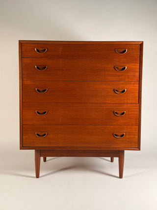 Mid century teak tall dresser, tall dresser, Peter Hvidt Dresser, Mid-Century Modern Peter Hvidt tall teak dresser with clean lines, sculpted pulls, and beautifully grained wood veneer, Danish design circa 1960s.