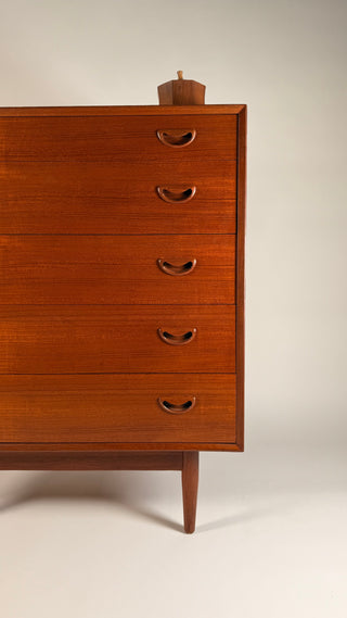 Mid century teak tall dresser, tall dresser, Peter Hvidt Dresser, Mid-Century Modern Peter Hvidt tall teak dresser with clean lines, sculpted pulls, and beautifully grained wood veneer, Danish design circa 1960s.