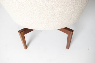 Pair of Jens Risom Swivel Lounge Chairs in Cream Bouclé with Walnut Bases