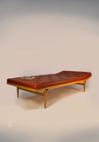 Original red leather daybed with light wooden frame