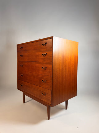 Mid century teak tall dresser, tall dresser, Peter Hvidt Dresser, Mid-Century Modern Peter Hvidt tall teak dresser with clean lines, sculpted pulls, and beautifully grained wood veneer, Danish design circa 1960s.