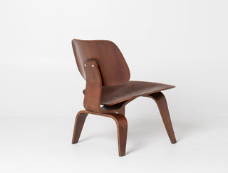 Wooden chair with a modern design on a white background
