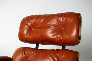 Eames Lounge Chair & Ottoman by Herman Miller - 3rd Generation in Orange Leather