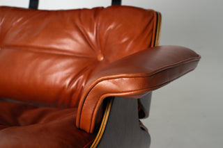 Eames Lounge Chair & Ottoman by Herman Miller - 3rd Generation in Orange Leather