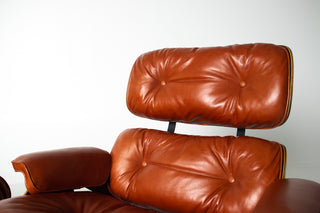 Eames Lounge Chair & Ottoman by Herman Miller - 3rd Generation in Orange Leather