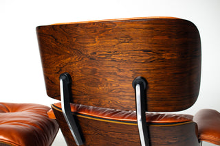 Eames Lounge Chair & Ottoman by Herman Miller - 3rd Generation in Orange Leather