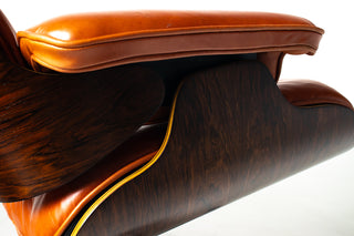 Eames Lounge Chair & Ottoman by Herman Miller - 3rd Generation in Orange Leather