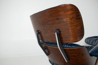 3rd Generation Eames Lounge Chair & Ottoman in Brazilian Rosewood and Midnight Blue Leather by Herman Miller