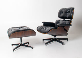 Early 1st Generation Eames Lounge Chair and Ottoman in Rosewood and Black Leather