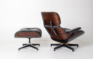 Early 1st Generation Eames Lounge Chair and Ottoman in Rosewood and Black Leather
