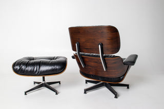 Early 1st Generation Eames Lounge Chair and Ottoman in Rosewood and Black Leather