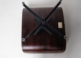 Early 1st Generation Eames Lounge Chair and Ottoman in Rosewood and Black Leather