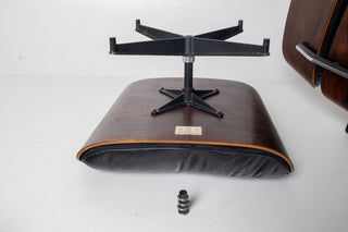 Early 1st Generation Eames Lounge Chair and Ottoman in Rosewood and Black Leather