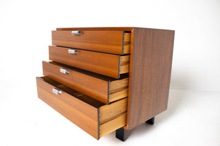 Authentic George Nelson walnut dresser with drawers open showing oak drawer boxes and dovetail joinery construction.