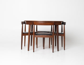 Restored Danish modern teak dining set with nesting chairs
