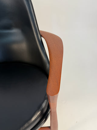 Teak Wood arm detail on Elizabeth chair in black leather