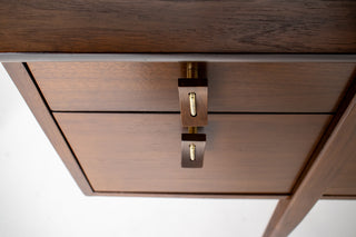 Mid-century modern walnut desk by Stanley Young with brass accented pulls