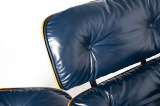 3rd Generation Eames Lounge Chair and Ottoman in Brazilian Rosewood & Navy Blue Leather by Herman Miller