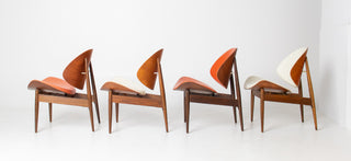 Set of four Seymour James Weiner for Kodawood Mid Century Modern clam shell dining chairs in walnut with original orange and ivory upholstery.