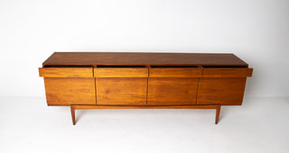 Exceptional old-growth teak grain and professional restoration on vintage Danish Modern credenza.