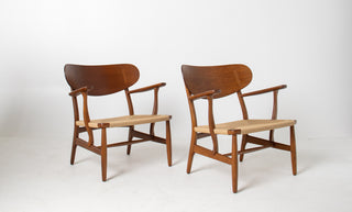 Pair of Hans Wegner CH22 Lounge Chairs in Oak