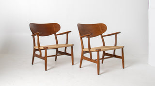 Pair of Hans Wegner CH22 Lounge Chairs in Oak