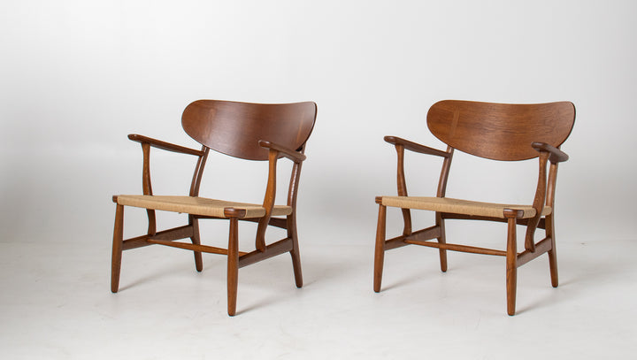 Pair of Hans Wegner CH22 Lounge Chairs in Oak