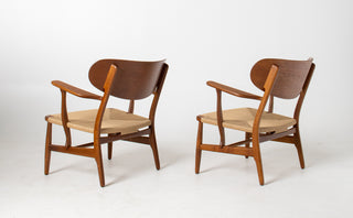 Pair of Hans Wegner CH22 Lounge Chairs in Oak