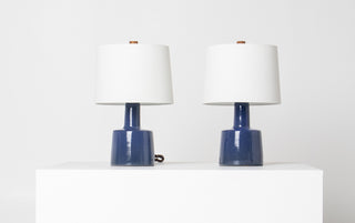 Matched pair of mid-century Gordon Martz Marshall Studios blue glazed ceramic lamps with new white drum shades, circa 1960s