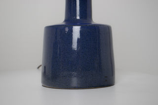Close-up of speckled cobalt blue glaze on Gordon Martz Marshall Studios ceramic lamp base, showing rich texture and high-gloss finish