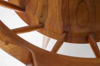 Close-up of a wooden chair with a white background