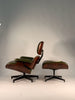 Restored Vintage Eames Lounge Chair in rosewood and new leather cushions