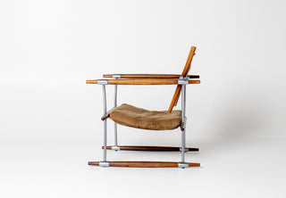 rosewood and metal scandinavian chair on white paper
