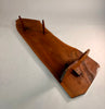 The underside view of George Nakashima conoid coffee table showing the gently pencil written name of the buyer in George Nakashimas' hand.