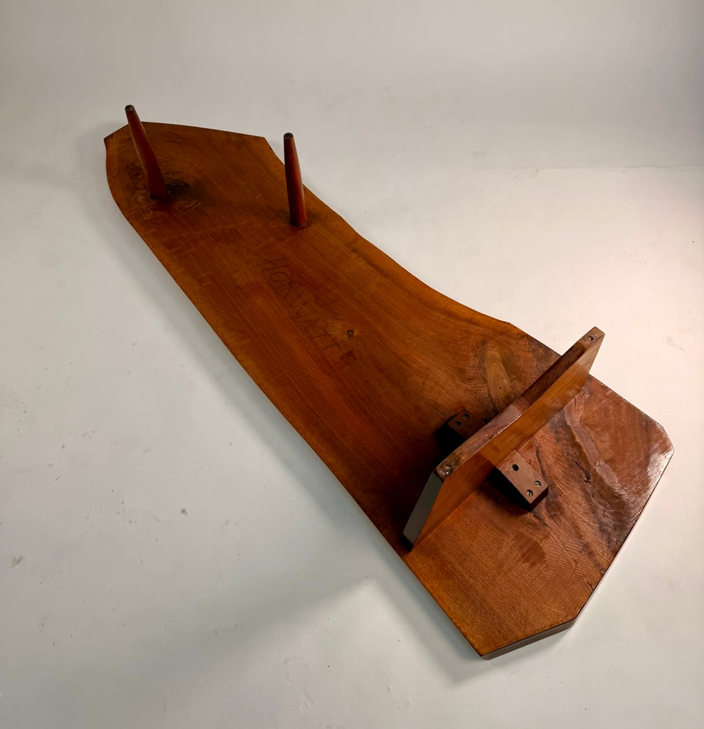 The underside view of George Nakashima conoid coffee table showing the gently pencil written name of the buyer in George Nakashimas' hand.