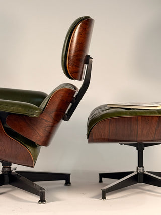 Restored Vintage Eames Lounge Chair in rosewood and new leather cushions
