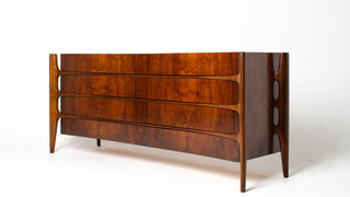 walnut dresser with exoskeletal legs on white background