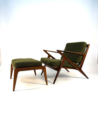 Scandinavian Modern wood lounge chair in green wool fabric.
