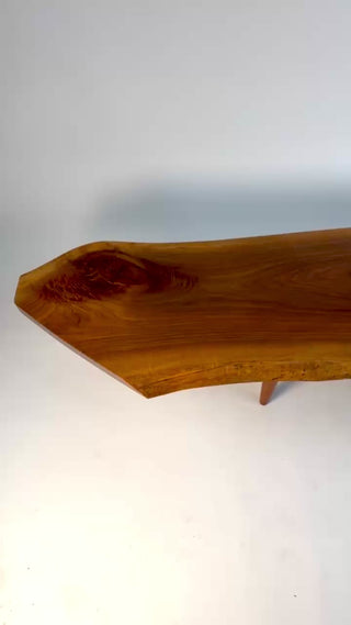 Original George Nakashima Conoid coffee table in English walnut with rosewood butterfly joints, organic freeform top, and rich wood grain, handcrafted circa 1960s.

