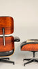 Rosewood Eames Lounge chair and ottoman in rosewood and black leather. fully restored.